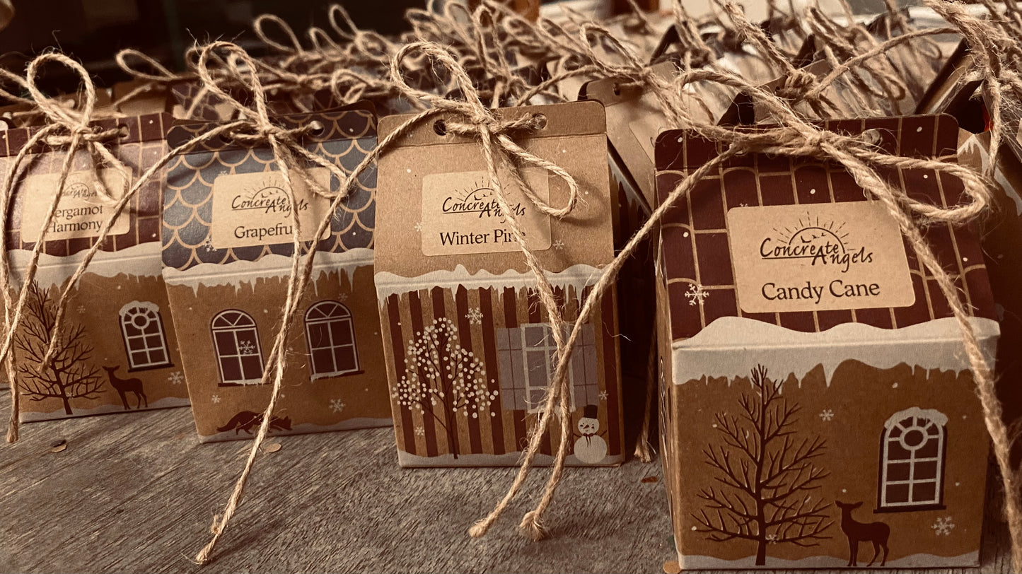 2 oz jar of tallow cream in house ornament